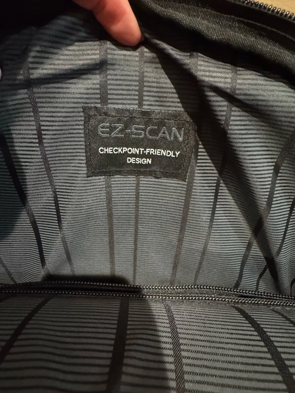 Kenneth Cole Reaction Black Travel Backpack with Multiple Zip Pockets